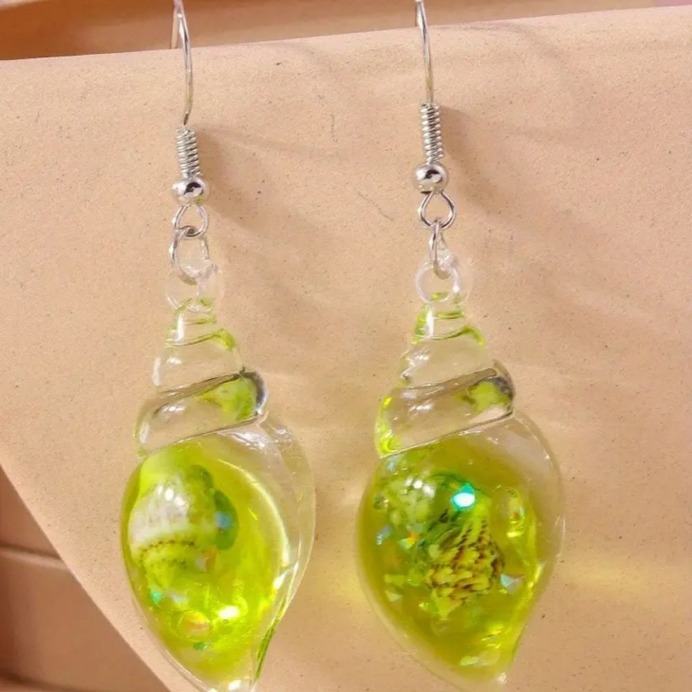 Hand crafted glowing seashell dangle earrings